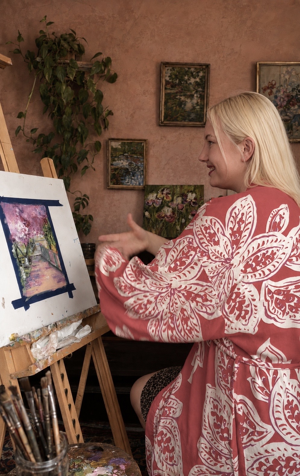 Artist Marina Stognieva during the creation of Cherry Trees Bloom in Uzhhorod